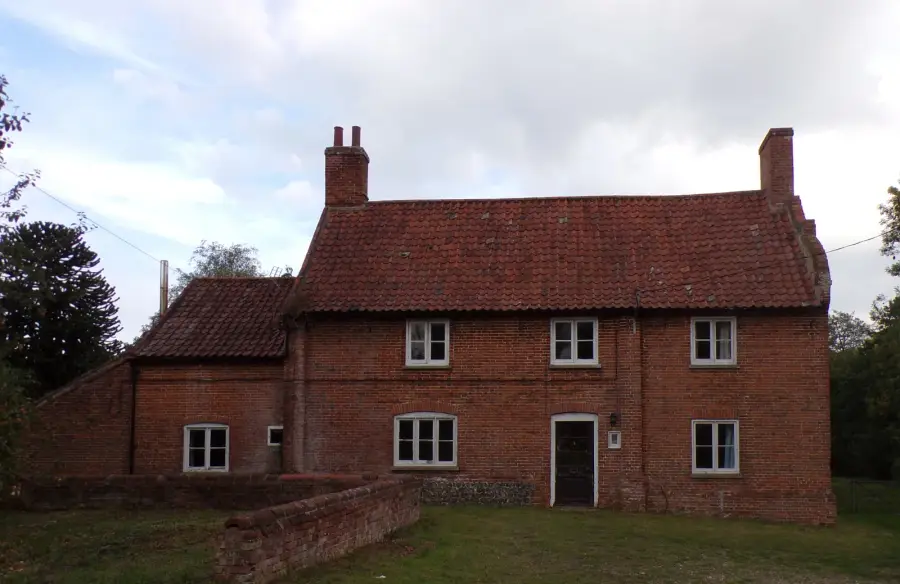 Traditional red-brick Norfolk farmhouse