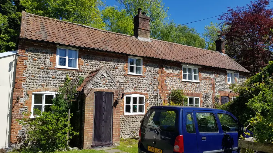 A flint-and-brick cottage